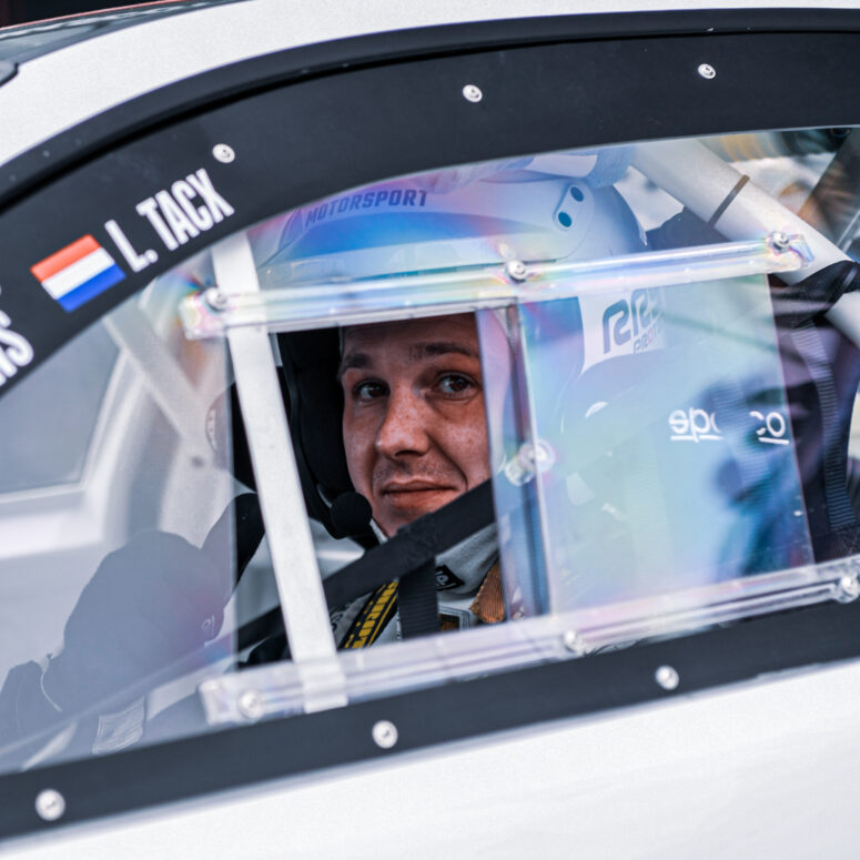 Driver Supreme Motorsport Driver in Racecar